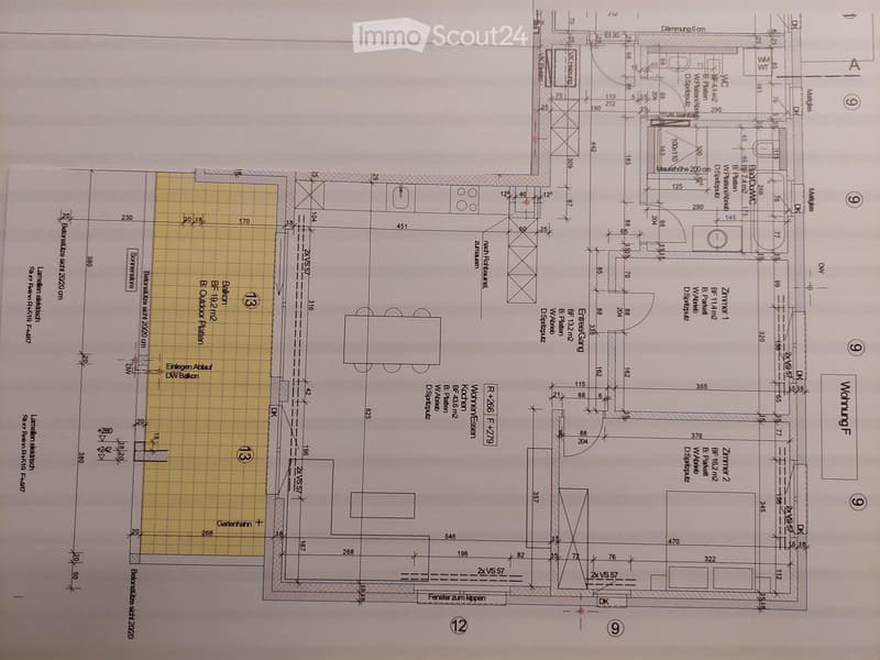 Floor plan showing a residential layout with multiple rooms, including a kitchen, living room, bedrooms, bathrooms, and outdoor areas.