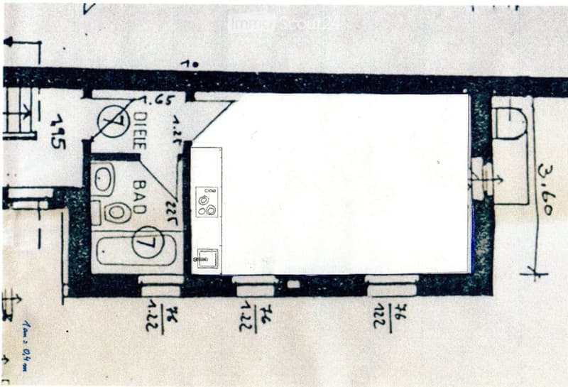 Floor plan showing a bathroom, living area, and entrance. Dimensions and labels are visible.