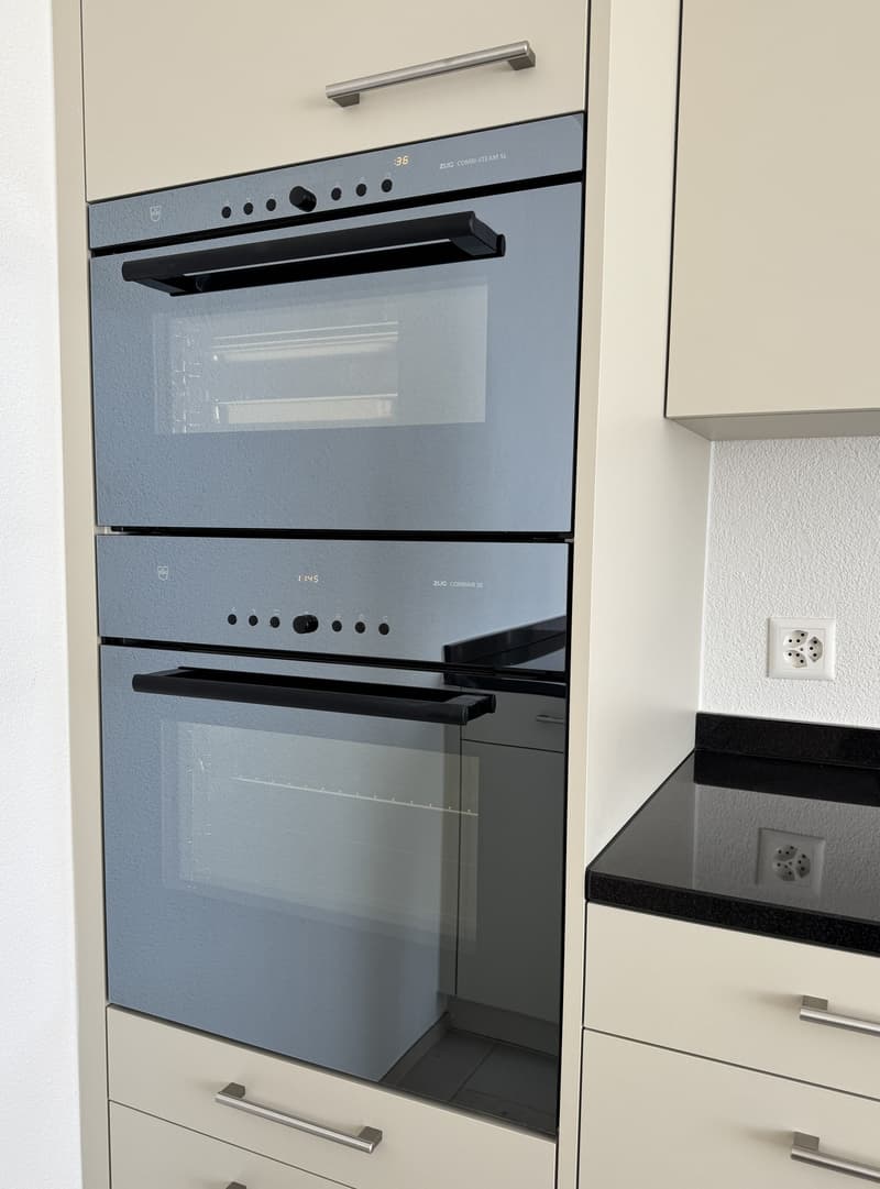 Modern, sunny 4.5-room apartment with balcony, parking space, and large cellar compartment (6)