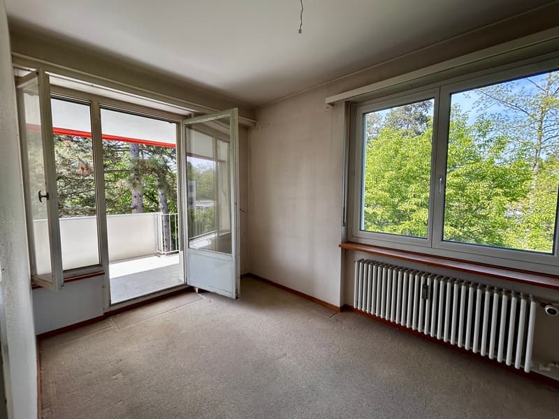 Spacious 5-room apartment with balcony, beautiful view & extra room on the ground floor (in building rights) (9)