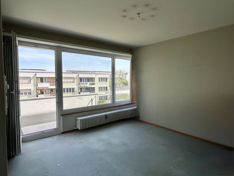 Spacious 5-room apartment with balcony, beautiful view & extra room on the ground floor (in building rights) (14)