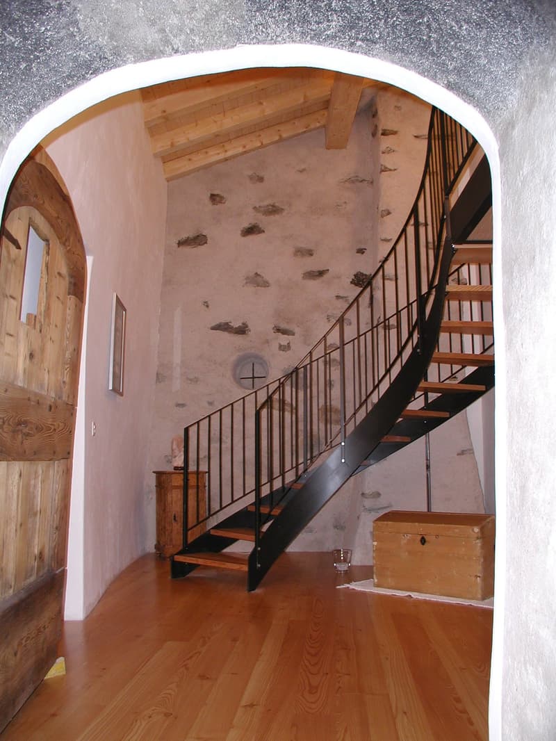 wooden door, wooden floor, spiral staircase, wooden chest, wooden cabinet, picture frame