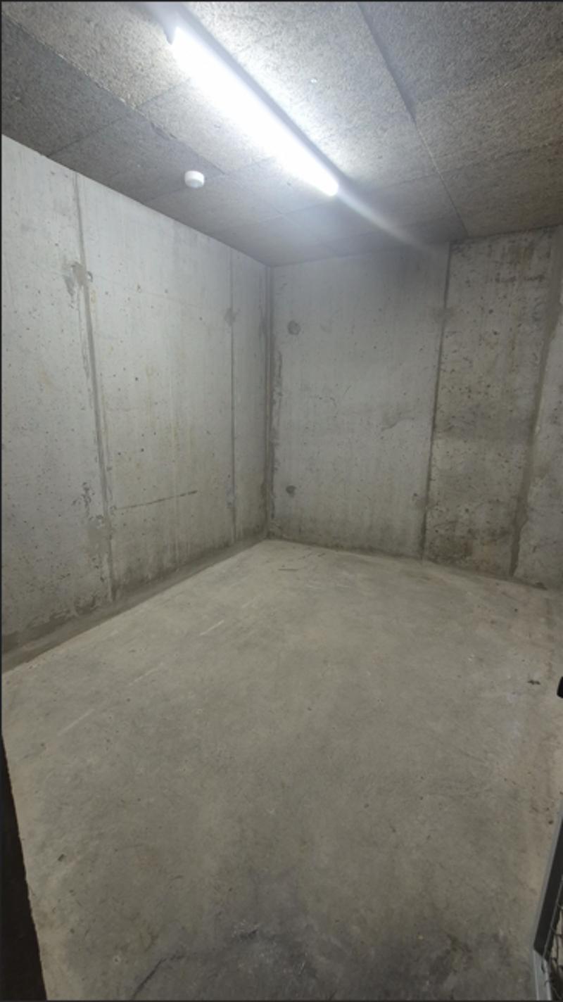 Parking space for rent in underground parking of a building in Eysins (3)