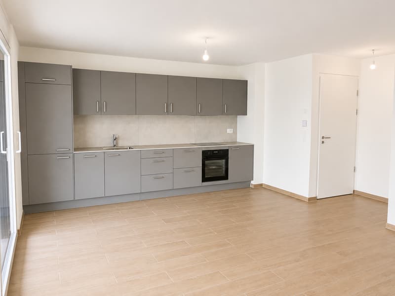 1er étage – Neuf – Places de parc intérieure – Grand balcon (3)