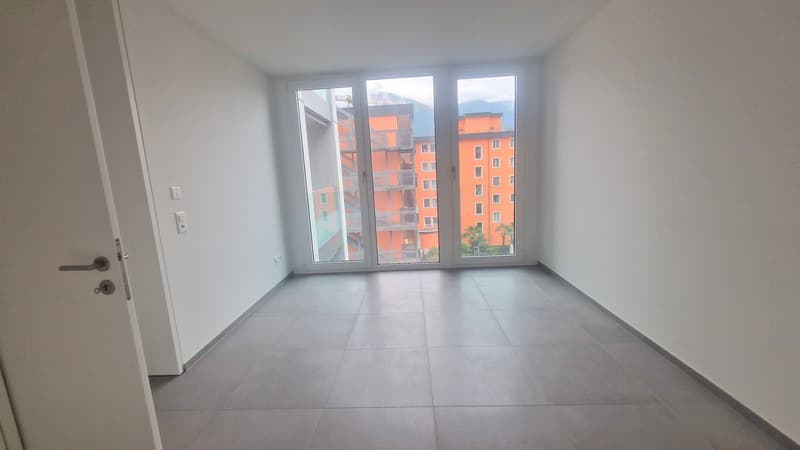 LUMINOSO E MODERNO 4.5 LOCALI CON VISTA LAGO (10)
