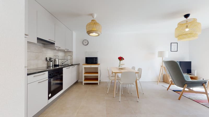 modern design, dining table, kitchen area, white cabinets, microwave, picture frame, clock, wooden chair, floor lamp, TV