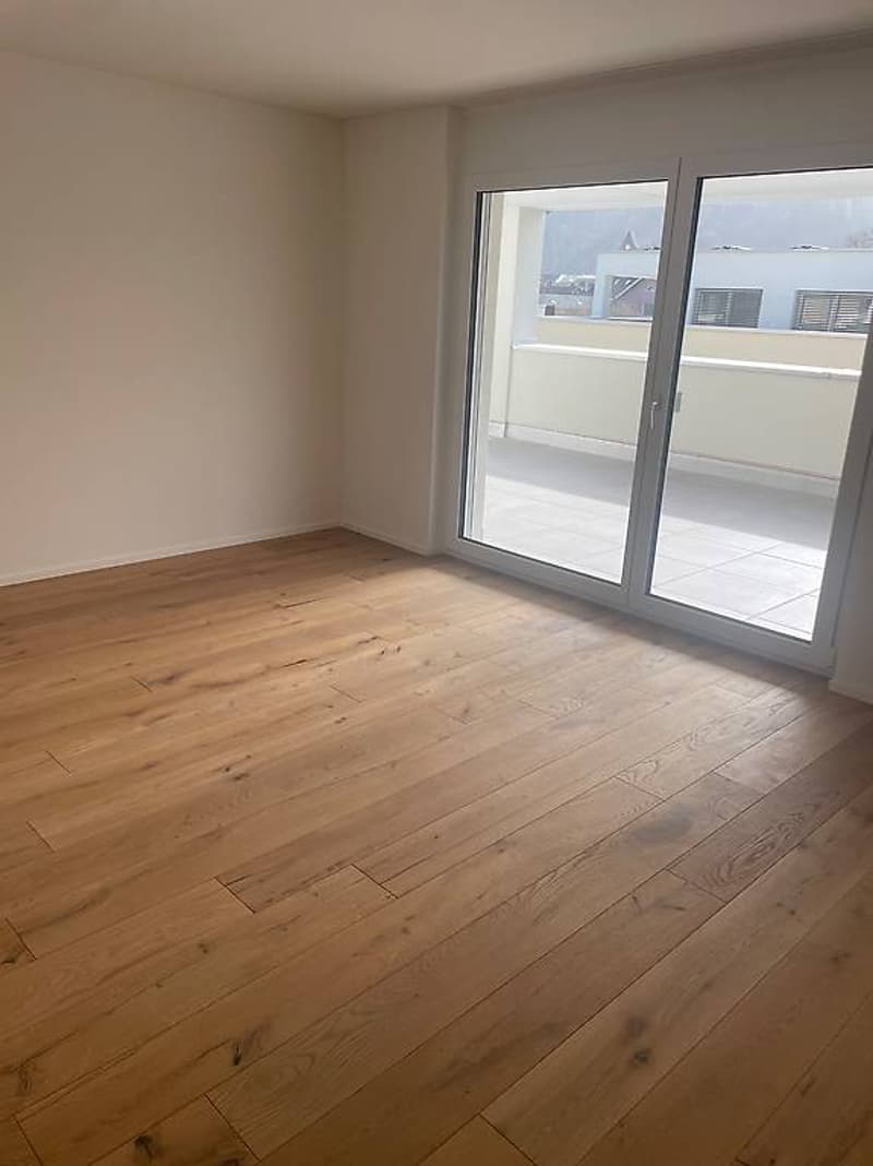 empty room, wooden floor, sliding glass door, balcony