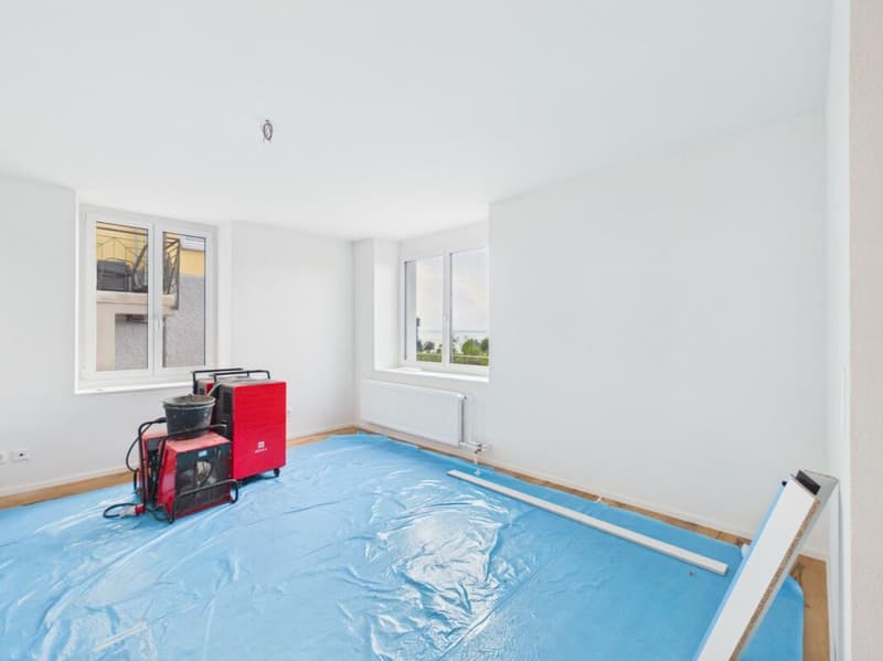 Exclusive 2.5-room apartment | First occupancy | Lake view | Solid wood parquet | Seating area | Washing tower (9)