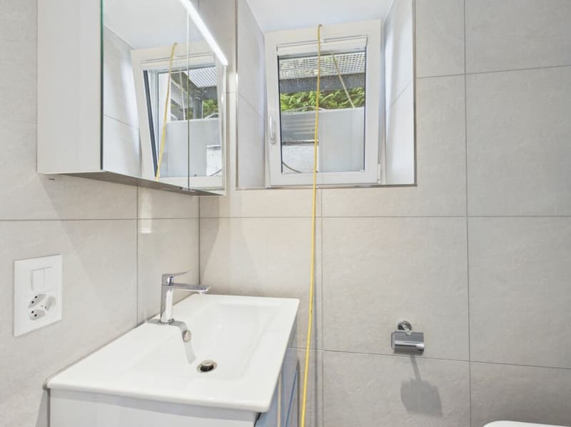 Exclusive 2.5-room apartment | First occupancy | Lake view | Solid wood parquet | Seating area | Washing tower (11)