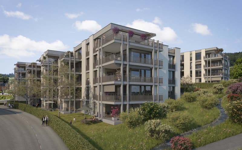 Modern apartment building with multiple floors, balconies, and a landscaped garden area.