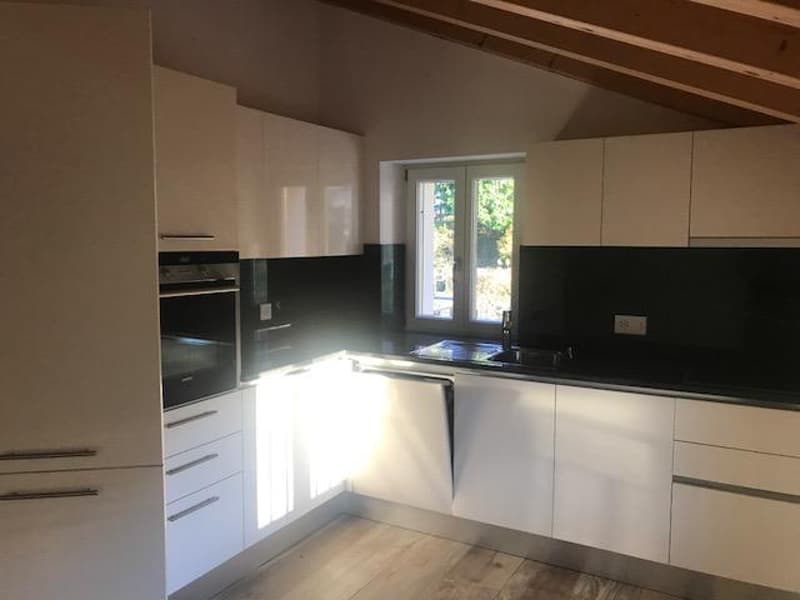 Attico con stupenda vista lago in casa di soli 3 appartamenti (15)