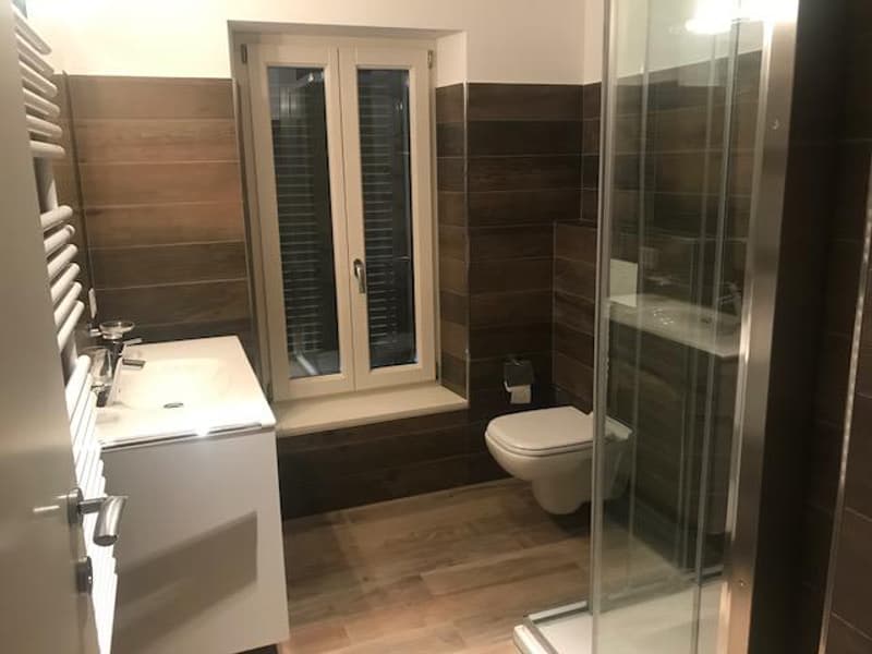 Attico con stupenda vista lago in casa di soli 3 appartamenti (10)