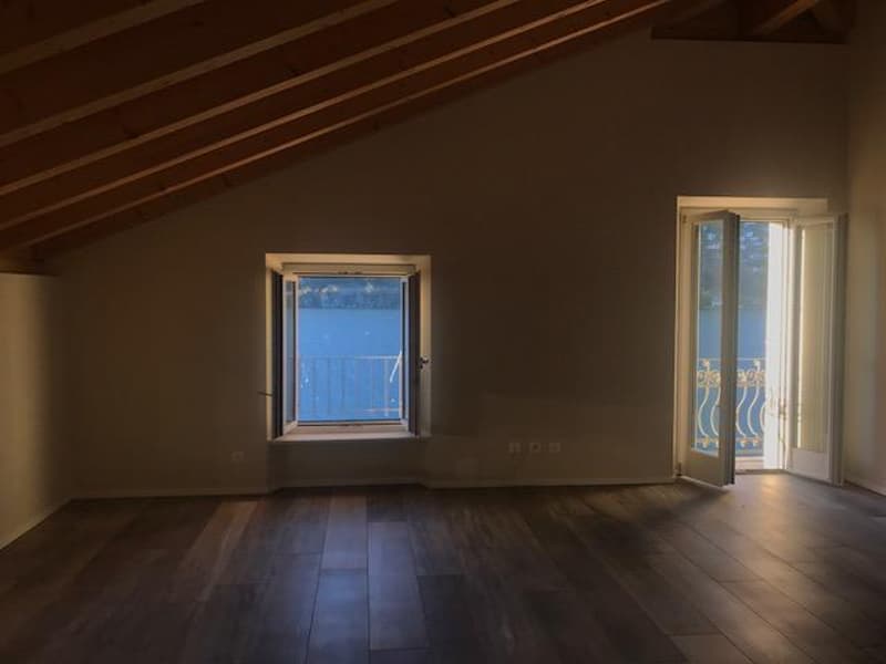 Attico con stupenda vista lago in casa di soli 3 appartamenti (11)