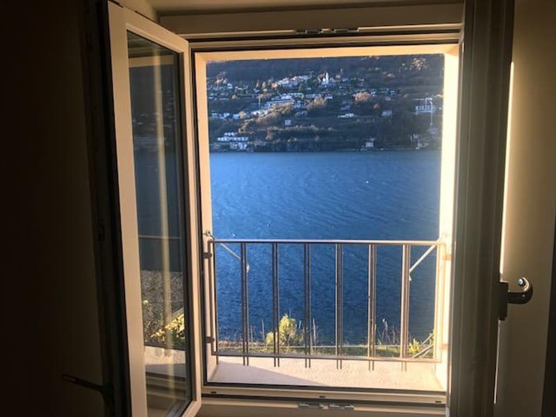 Attico con stupenda vista lago in casa di soli 3 appartamenti (5)