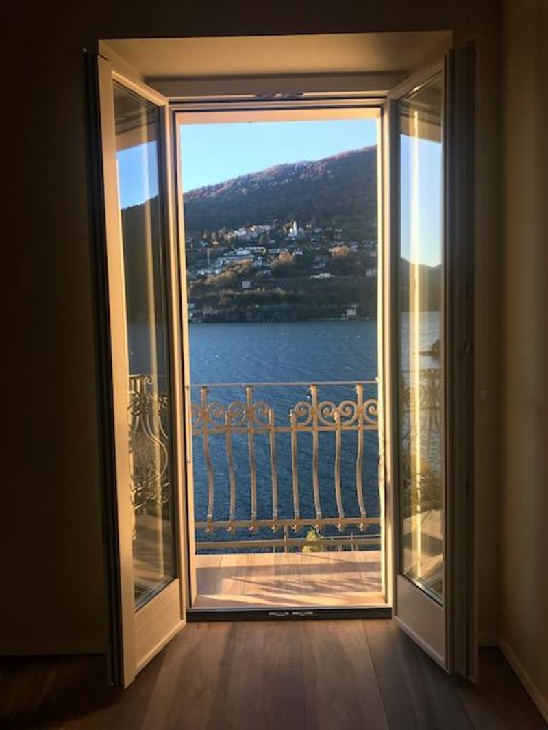 Attico con stupenda vista lago in casa di soli 3 appartamenti (1)