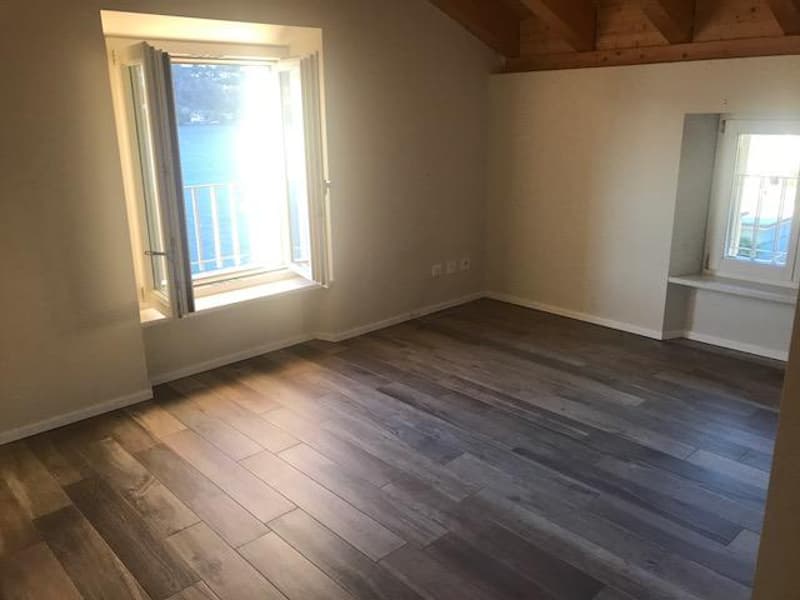 Attico con stupenda vista lago in casa di soli 3 appartamenti (6)