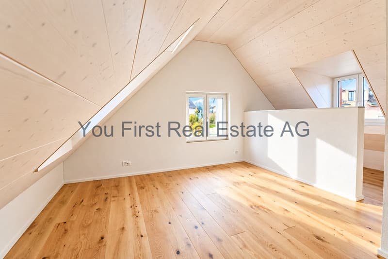 Loft mansardé baigné de lumière