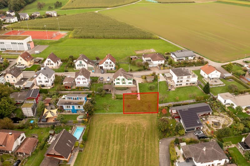 Small residential houses, detached or semi-detached, residential land with a square indicated by a red line