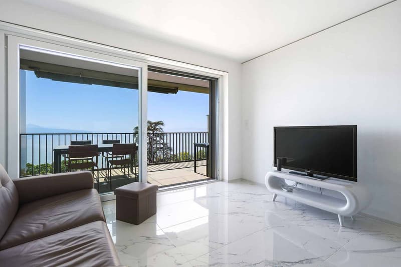 Véritable petit bijou de 2.5 p avec grand balcon et vue époustouflante sur le Lac (5)