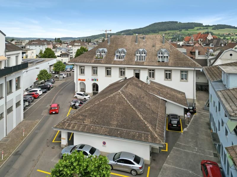 Vollvermietetes Wohn-/Geschäftshaus an zentraler Lage (1)