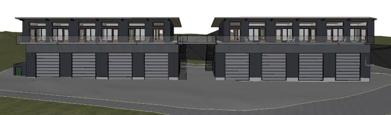 A two-story building with a basement, balconies, and several garages.