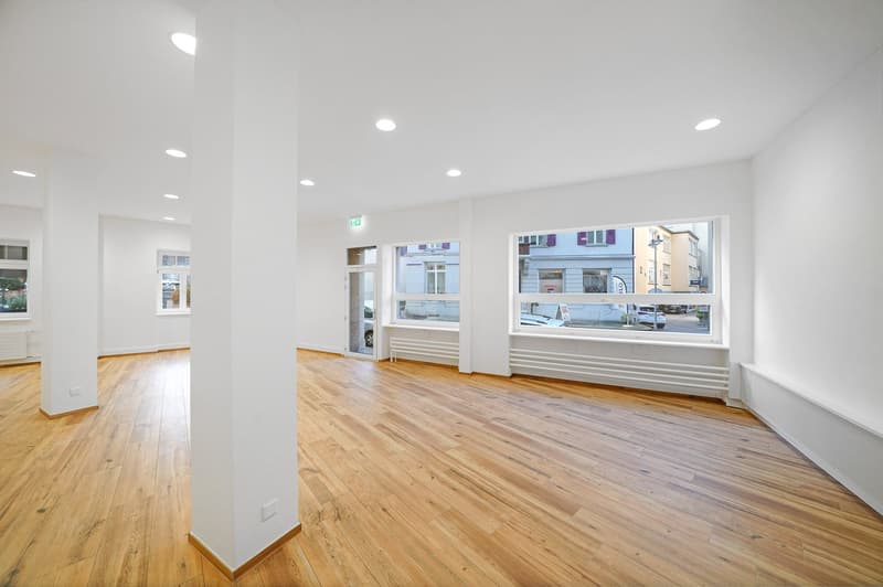 empty room, wooden floor, white walls, large windows, radiators