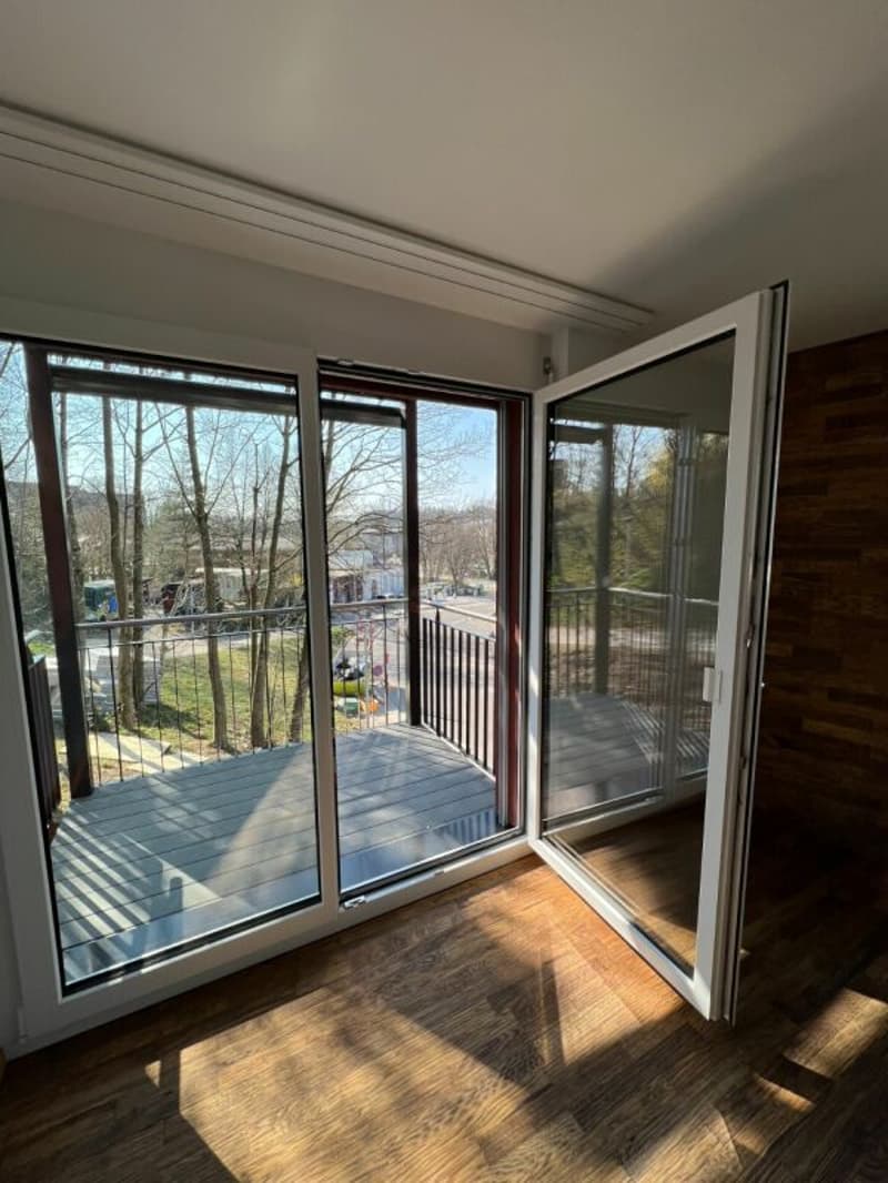 Appartement stylé de 2,5 pièces avec balcon et caractère en bois (1)