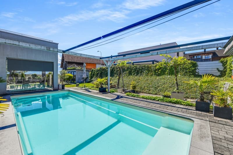 Modernes Wohnerlebnis mit Weitblick - Einfamilienhaus mit Pool, Gartenidylle und Panoramasicht (26)