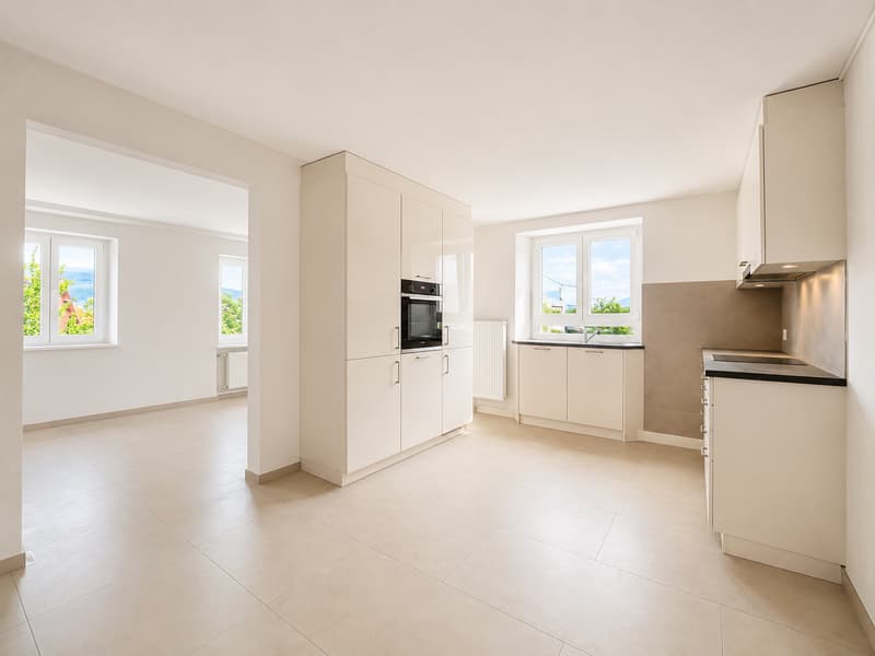 Magnificent 4,5 rooms completely renovated with 97 m² in the heart of Rossemaison (1)