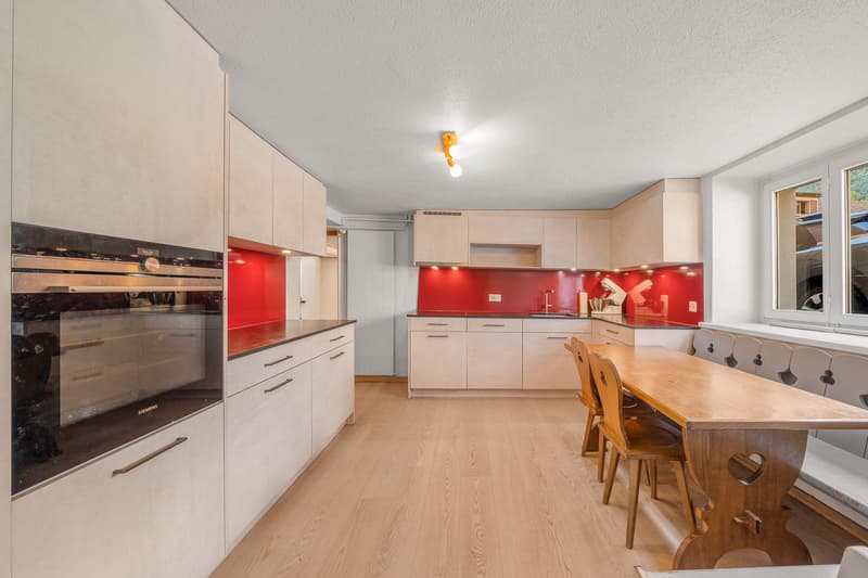 Village house with 3 apartments and garden as well as land potential (12)