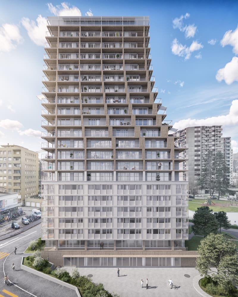 Multi-story residential building, glass windows, balconies, beige facade, urban setting