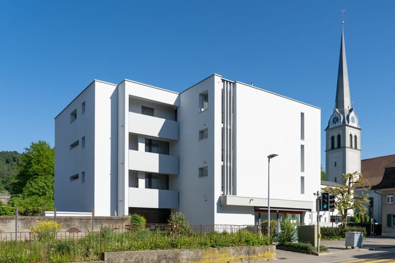 Residential and commercial building with retail space/office, five apartments and a single office (3)
