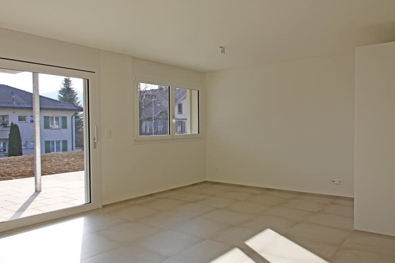 Wohnbereich mit Zugang zur Terrasse