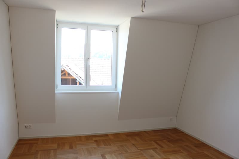 empty room, white walls, wooden floor, window with view