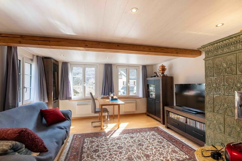 Wohnzimmer mit Kachelofen