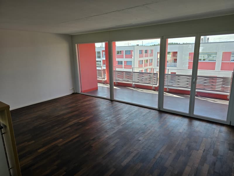 Wohnzimmer mit Balkon