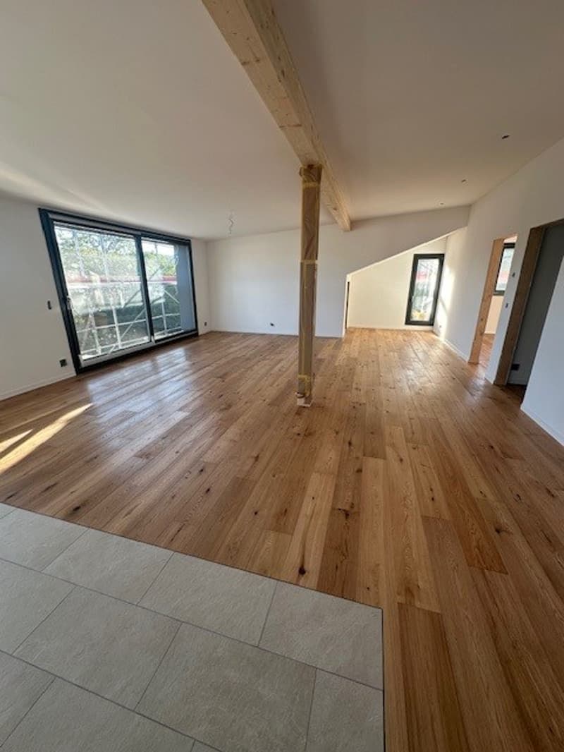 Moderne 3.5-Zimmer-Dachwohnung in Boll – Neubau mit Aussicht (1)