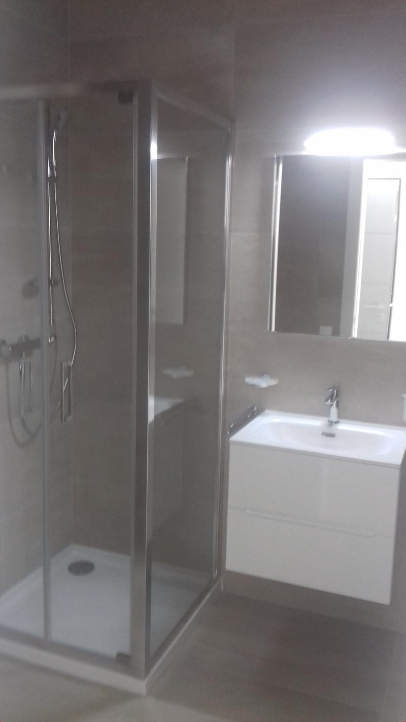Shower enclosure, vanity unit with sink, mirror