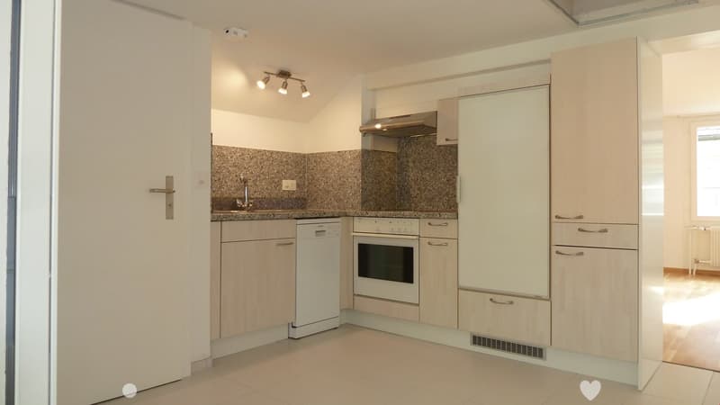 modern kitchen with white appliances, granite countertops, wooden cabinets, tiled floor