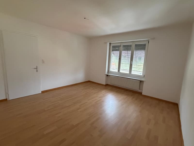 empty room, wooden floor, white walls, window with blinds, white door