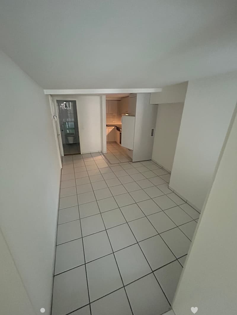 white tiled floor, open door, hallway