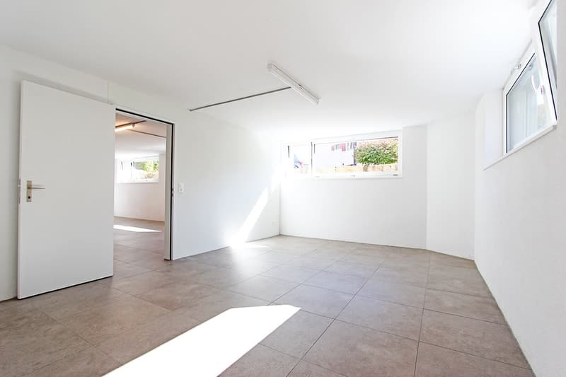 empty room, white walls, tiled floor, white door, two windows