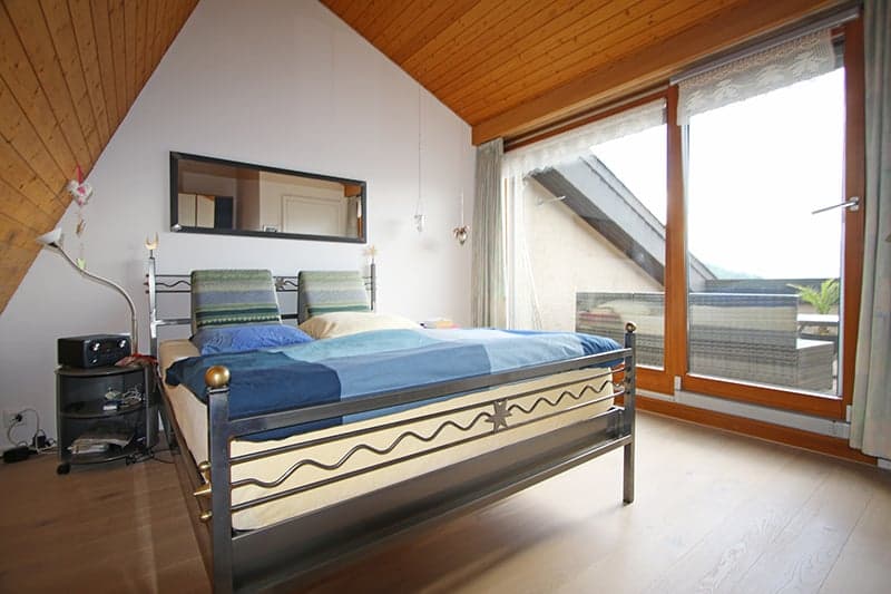 Dachzimmer mit Balkon