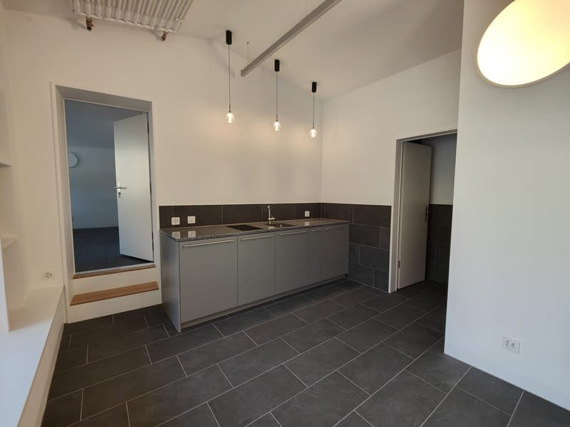 kitchen, countertops, sink, faucet, cabinets, tiled floor, ceiling lamps, doorways