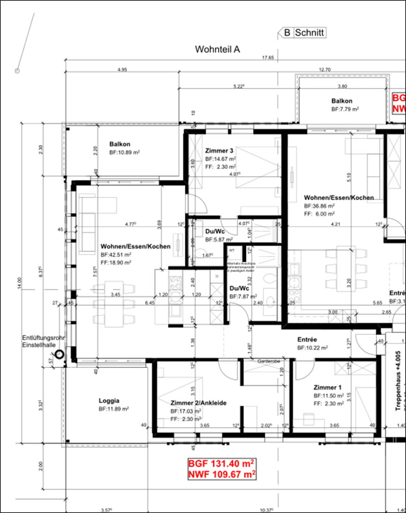 The image shows the floor plan of an apartment. It consists of a living room/kitchen area, 3 bedrooms, 2 bathrooms, a balcony, and an entrance area.