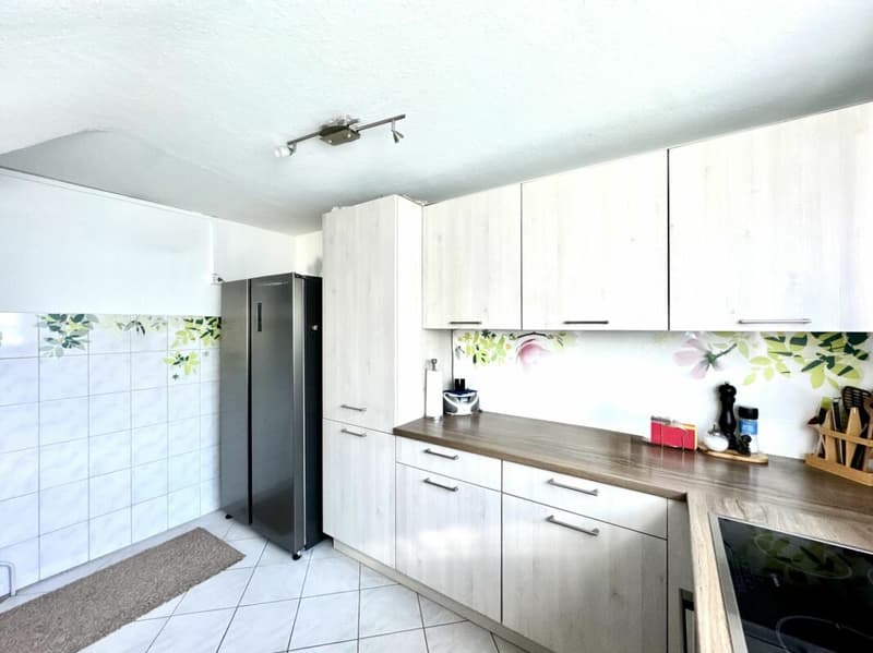 Maison mitoyenne familiale dans un quartier résidentiel calme (6)