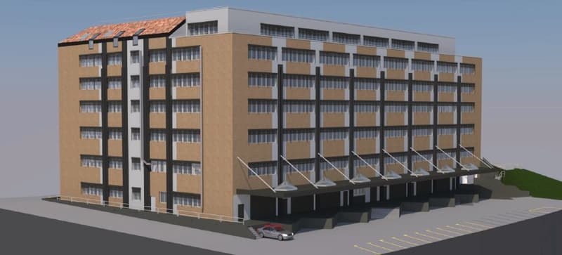 5 story building, brown exterior, multiple windows, parking lot