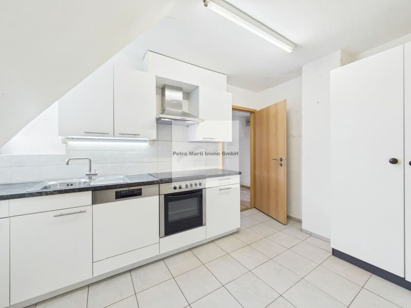 Appartement mansardé de 3,5 pièces dans un quartier calme (1)