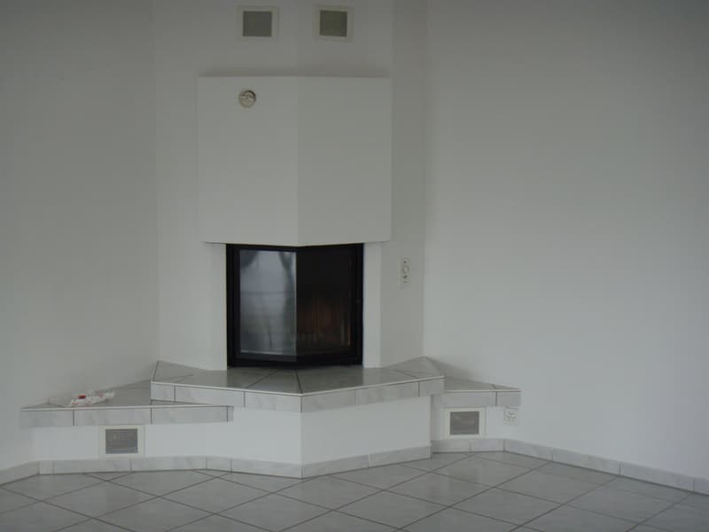 Wohnzimmer mit Kamin
