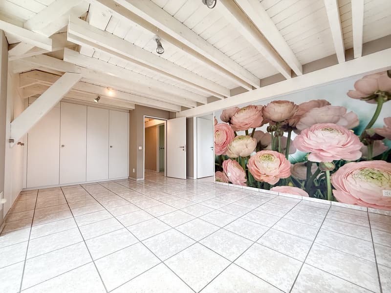 white tiled floor, white walls, white wooden ceiling, white cabinets, decorative floral wallpaper, recessed ceiling lights